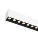 White recessed linear LED light fixture with black baffle.