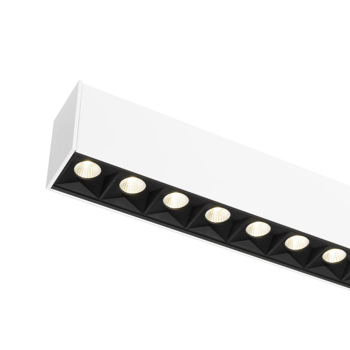 Recessed linear light fixture with multiple LED lamps, white finish.