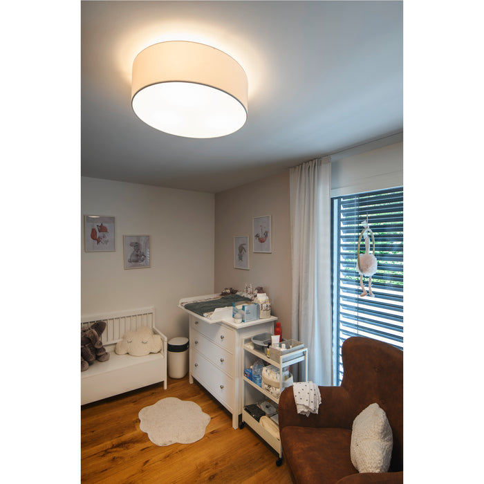 Fabric drum ceiling light, flush mount, in a neutral nursery.